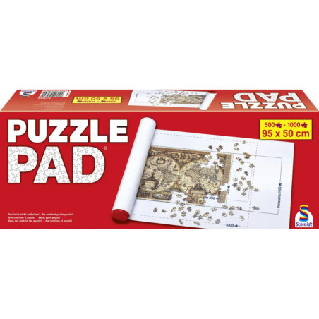 Puzzle Pad Box mit teils gerolltem, begonnenem Puzzle auf Matte und einigen losen Teilen daneben.
