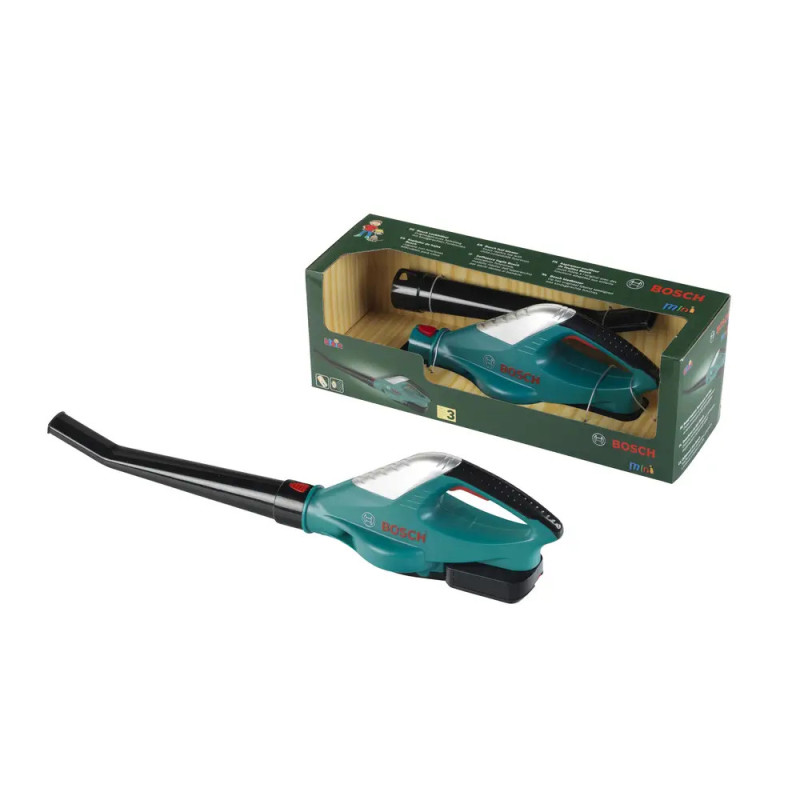 Ein Bosch Laubbläser-Spielzeug steht vor seiner grün-gelben Verpackung.