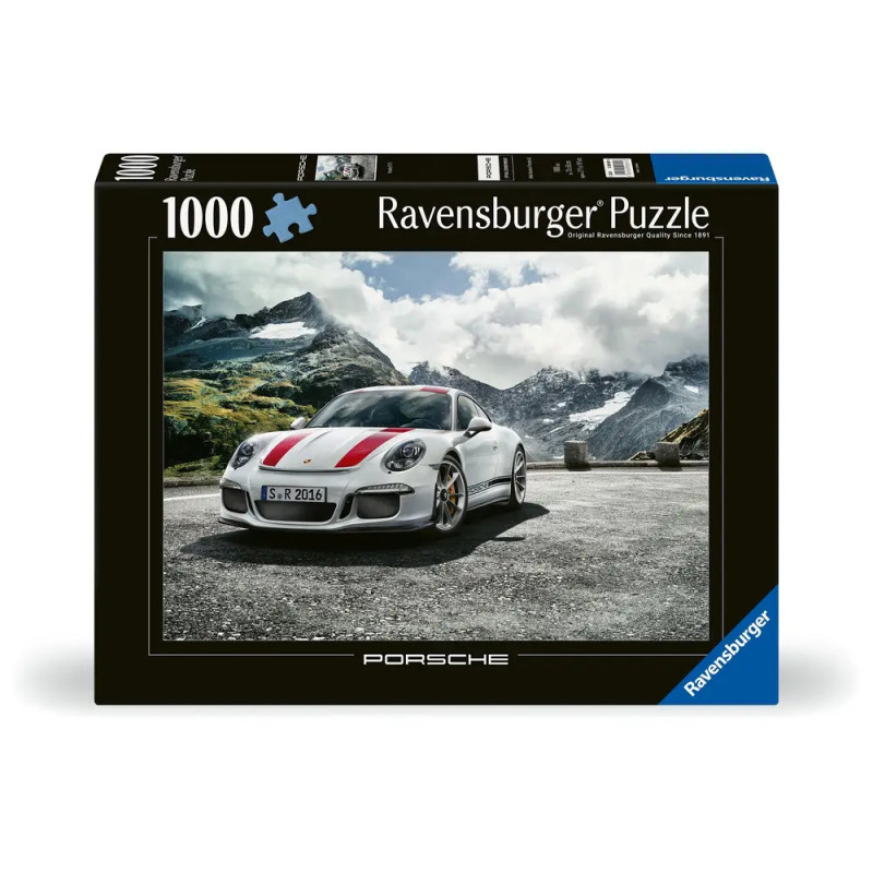 1000-teiliges Ravensburger Puzzle mit weißem Porsche auf Bergstraße, im Hintergrund verschneite Gipfel.