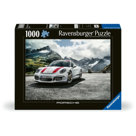 1000-teiliges Ravensburger Puzzle mit weißem Porsche auf Bergstraße, im Hintergrund verschneite Gipfel.