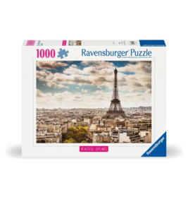 Ravensburger 1000 Teile Puzzle mit Eiffelturm und Pariser Skyline unter bewölktem Himmel.