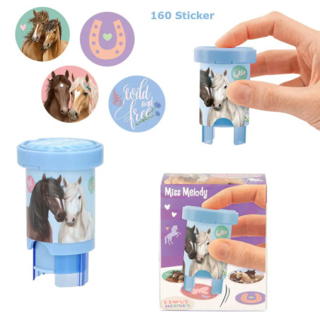 Hand hält einen pferdebezogenen Sticker-Spender mit abgebildeten Pferde-Stickern und Verpackung.