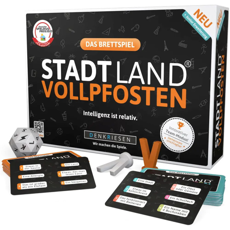 Box und Spielmaterial von Stadt Land Vollpfosten mit bunten Karten und einem Würfel.
