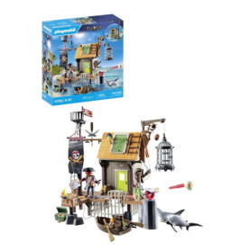 Playmobil Piratenset mit Hütte, Figuren, Zubehör und Hai Verpackung im Hintergrund sichtbar.