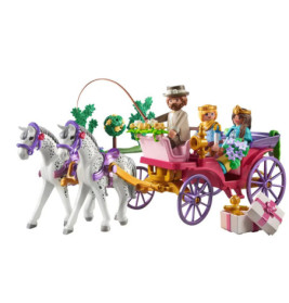 Spielzeugkutsche mit Figuren in königlicher Kleidung und Geschenken, bunt geschmückt.