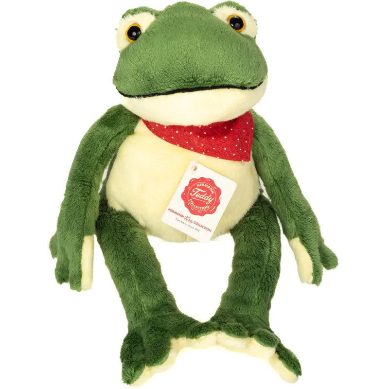 Grünes Plüschfrosch-Spielzeug mit rotem Punkteschal und Namensschild auf der Brust.