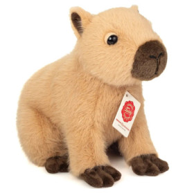 Plüsch-Wombat in Hellbraun mit dunkelbraunen Füßen, Ohren und Nase, trägt ein Etikett.