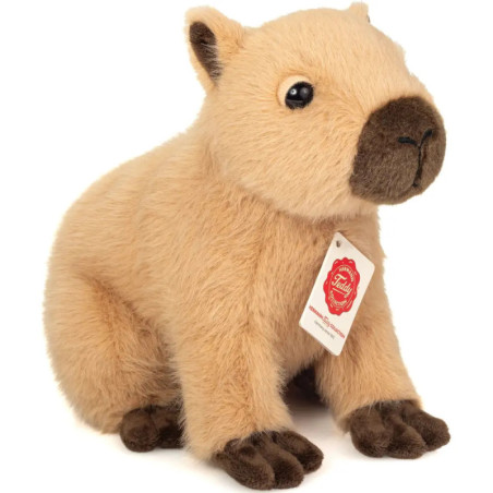 Plüsch-Wombat in Hellbraun mit dunkelbraunen Füßen, Ohren und Nase, trägt ein Etikett.