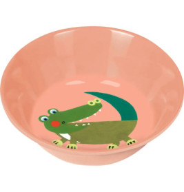 Rosa Schüssel mit gezeichnetem grünem Krokodil am inneren Boden.