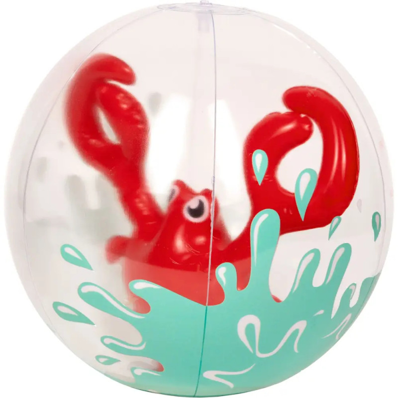 Eine rote Spielzeugkrabbe in einer transparenten Kugel mit türkisfarbenen Spritzmustern.