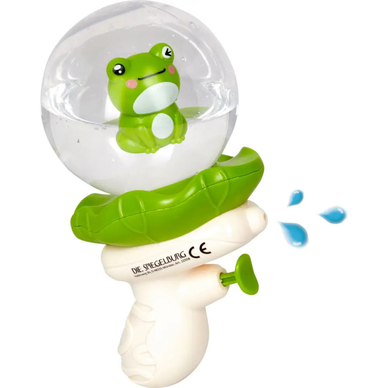 Wasserspritzpistole mit Frosch in transparenter Kugel, grünen Blättern und spritzendem Wasser. Wasserspritzpistole mit Frosch in transparenter Kugel, grünen Blättern und spritzendem Wasser.