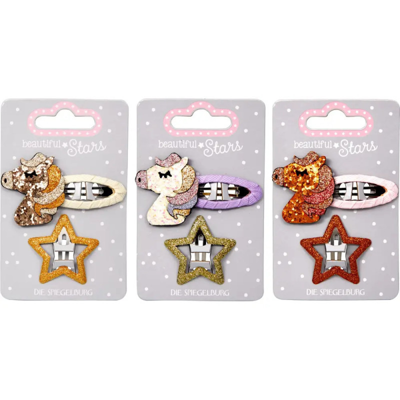Drei glitzernde Einhorn- und drei Stern-Haarspangen auf Karten mit gepunktetem Hintergrund.