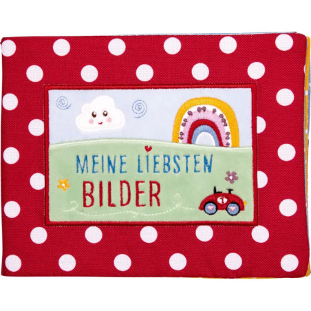 Rotes Fotoalbum mit weißen Punkten, Aufschrift Meine liebsten Bilder, dazu Regenbogen, Wolke, Auto.