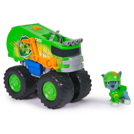 Grüner Spielzeug-Monstertruck mit großen Reifen und kleinem grünen Hund mit Helm daneben.