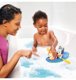 Bluey Kanu. Schau Bluey und Bingo zu, wie Sie über das Wasser Paddeln.