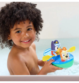 Bluey Kanu. Schau Bluey und Bingo zu, wie Sie über das Wasser Paddeln.