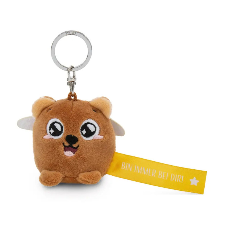 Plüschtier-Schlüsselanhänger mit großen Augen und gelbem Schild: BIN IMMER BEI DIR! samt weißem Stern.