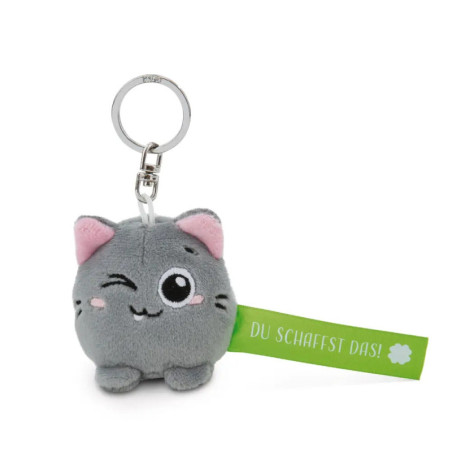 Grauer Katzenanhänger mit Zwinker-Gesicht und grünem Schild DU SCHAFFST DAS! in Weiß.