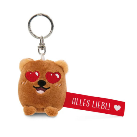 Plüschbär-Schlüsselanhänger mit Herzaugen und rotem ALLES LIEBE!-Anhänger mit weißem Herz.
