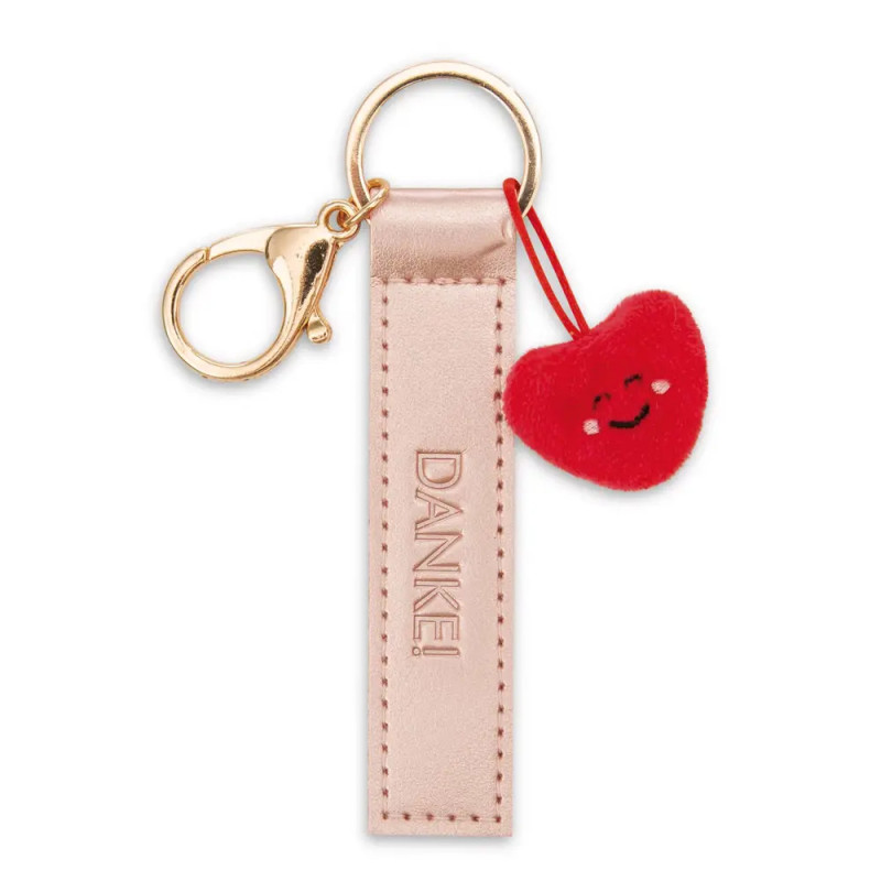 Goldener Schlüsselanhänger mit pinkem DANKE!-Anhänger und kleinem, lächelndem Herz-Anhänger.