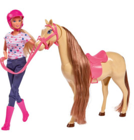 Barbie-Puppe in Reitkleidung hält die Zügel eines beigefarbenen Pferdes mit pinkem Sattel und Zaumzeug.