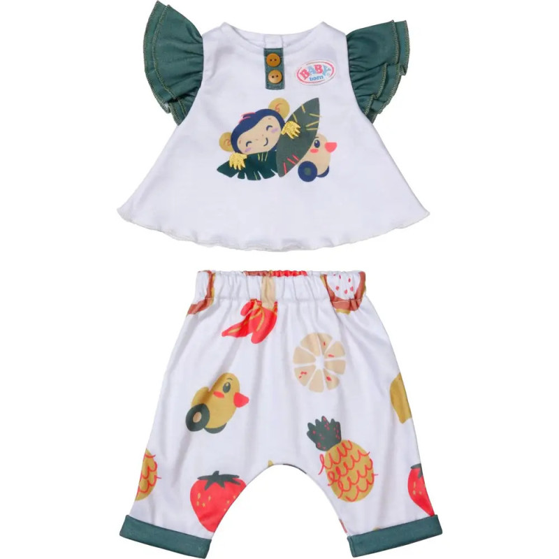 Kleinkind-Outfit mit Affenmuster-Oberteil, grünen Ärmeln und Hosen mit Fruchtmuster und Umschlägen. Kleinkind-Outfit mit Affenmuster-Oberteil, grünen Ärmeln und Hosen mit Fruchtmuster und Umschlägen.