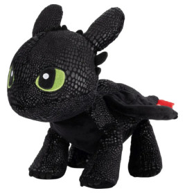 Plüschdrache in Schwarz mit grünen Augen, ähnelt Toothless aus Drachenzähmen leicht gemacht.