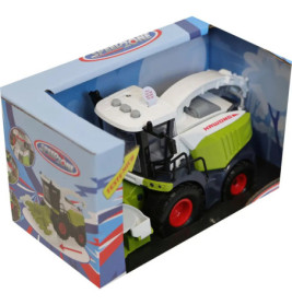 Spielzeugtraktor in blauer SpeedZone-Box, rote Räder, Aufschrift Kruone an der Seite.