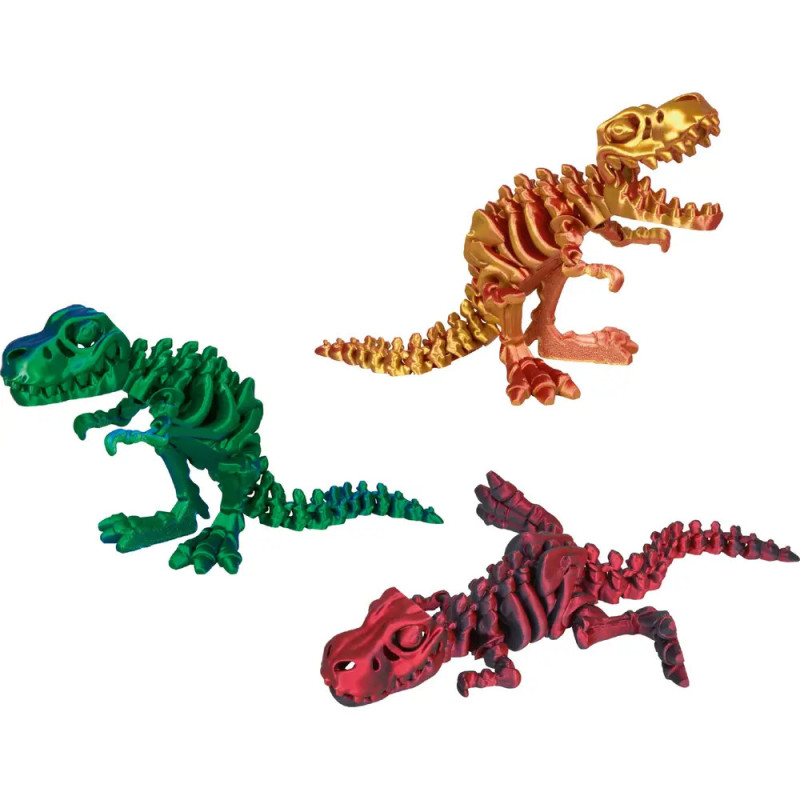 Drei bunte Dino-Skelettspielzeuge (grün, gold, rot) aus Kunststoff auf weißem Hintergrund.