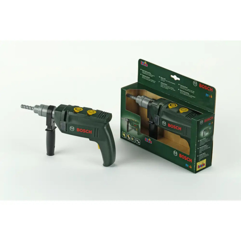 Ein Bosch-Spielzeugbohrer steht neben seiner grünen Verpackung auf weißem Hintergrund.