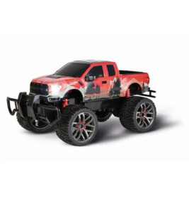 Roter und schwarzer Spielzeug-Monstertruck mit großen Reifen und robustem Design, aus schräger Frontansicht.