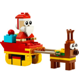 LEGO-Steine formen Santa im Schlitten, gezogen von einem Rentier - beide mit großen Comic-Augen.