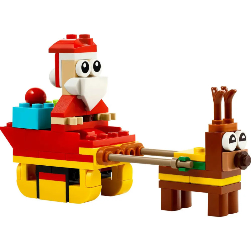LEGO-Steine formen Santa im Schlitten, gezogen von einem Rentier - beide mit großen Comic-Augen.