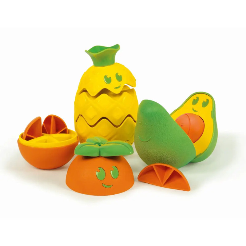 Vier bunte Spielfrüchte mit lachenden Gesichtern: Ananas, Avocado, Orange und ein Segment. Vier bunte Spielfrüchte mit lachenden Gesichtern: Ananas, Avocado, Orange und ein Segment.