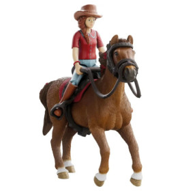 Spielfigur eines Mädchens mit Cowboyhut auf braunem Pferd mit Sattel und Zaumzeug.