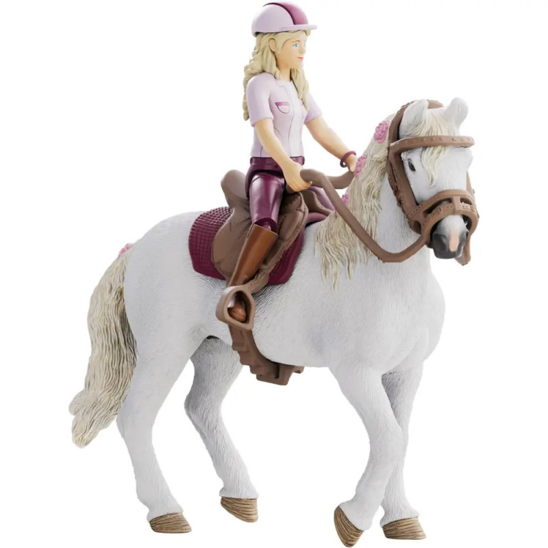 Spielfigur eines Mädchens in Reitkleidung auf weißem Pferd mit Sattel und Zaumzeug. Spielfigur eines Mädchens in Reitkleidung auf weißem Pferd mit Sattel und Zaumzeug.
