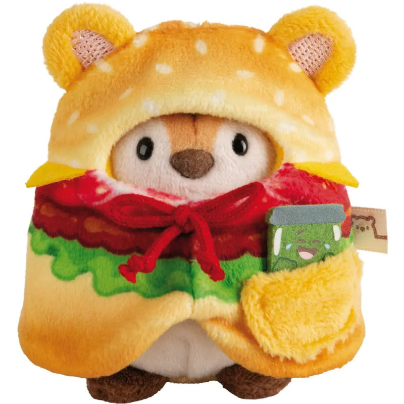 Plüschfigur im Hamburger-Kostüm mit Bärenohren, rotem Band und grünem Getränk in der Hand.