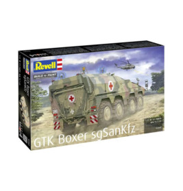 Revell-Bausatz: GTK Boxer Sanitätsfahrzeug in Tarnung, Helikopter im Hintergrund.