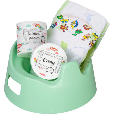 Grünes Töpfchen mit einer Windel, Toilettenpapier und Creme darin.
