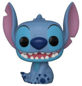 Blauer Cartoon-Alien mit großen Ohren, schwarzen Augen und breitem Lächeln sitzt.