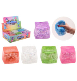 Fünf glitzernde, weiche Würfel in verschiedenen Farben, eine Hand drückt den blauen oben rechts.