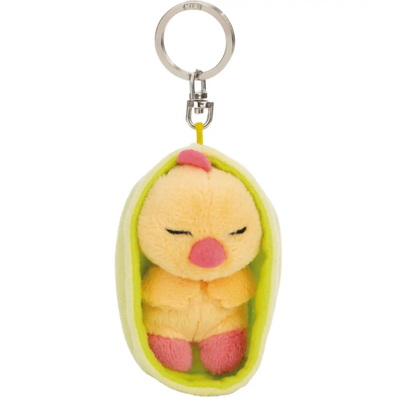 Plüsch-Küken-Schlüsselanhänger in grüner Erbsenschote mit geschlossenen Augen und rosa Schnabel.