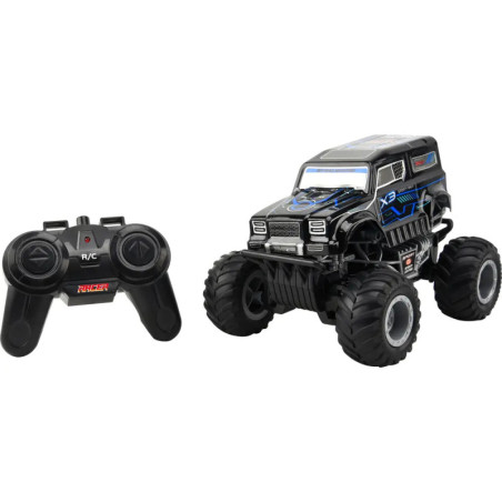 Schwarzer ferngesteuerter Monstertruck mit großen Reifen neben schwarzer Gamepad-Fernbedienung. Schwarzer ferngesteuerter Monstertruck mit großen Reifen neben schwarzer Gamepad-Fernbedienung.