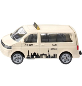 Spielzeugtaxi im Van-Stil mit Berliner Skyline und TAXI-Schild, seitlich betrachtet.