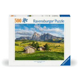 Ravensburger Puzzle mit 500 Teilen: Berge, grüne Wiesen und Holzhütten unter blauem Himmel.