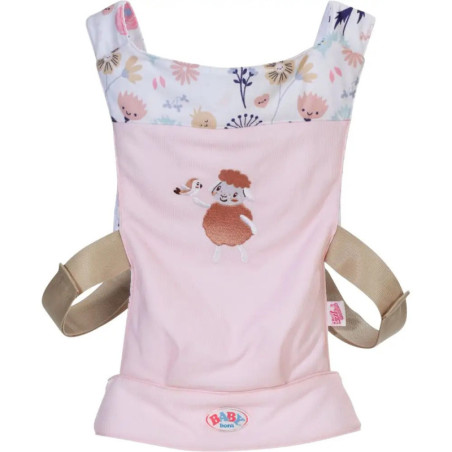 Hellrosa Babytrage mit Blumenmuster-Trägern und Schaf-Motiv auf der Vorderseite.