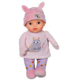 Babypuppe in rosa Kleidung, mit Mütze mit Hasenohren und gepunkteter Leggings.