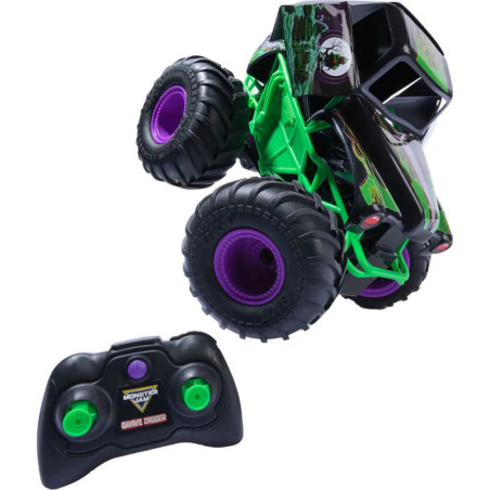 Monstertruck-Spielzeug mit Fernbedienung, lila-grüne Akzente, steht schräg auf großen Reifen.