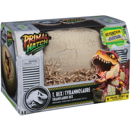 Primal Hatch T. Rex Spielzeug in Box mit aufgebrochenem Ei und Dino-Illustration auf der Verpackung.