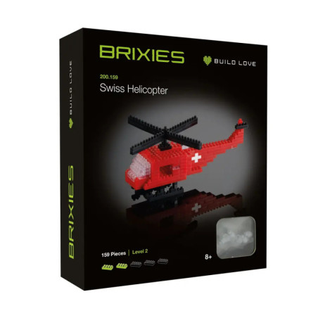 Brixies Swiss Helicopter Bausatzbox mit rotem Helikoptermodell aus kleinen Bausteinen.